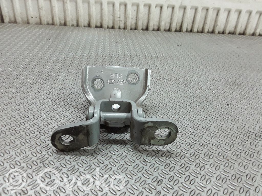 Bisagra superior de la puerta trasera