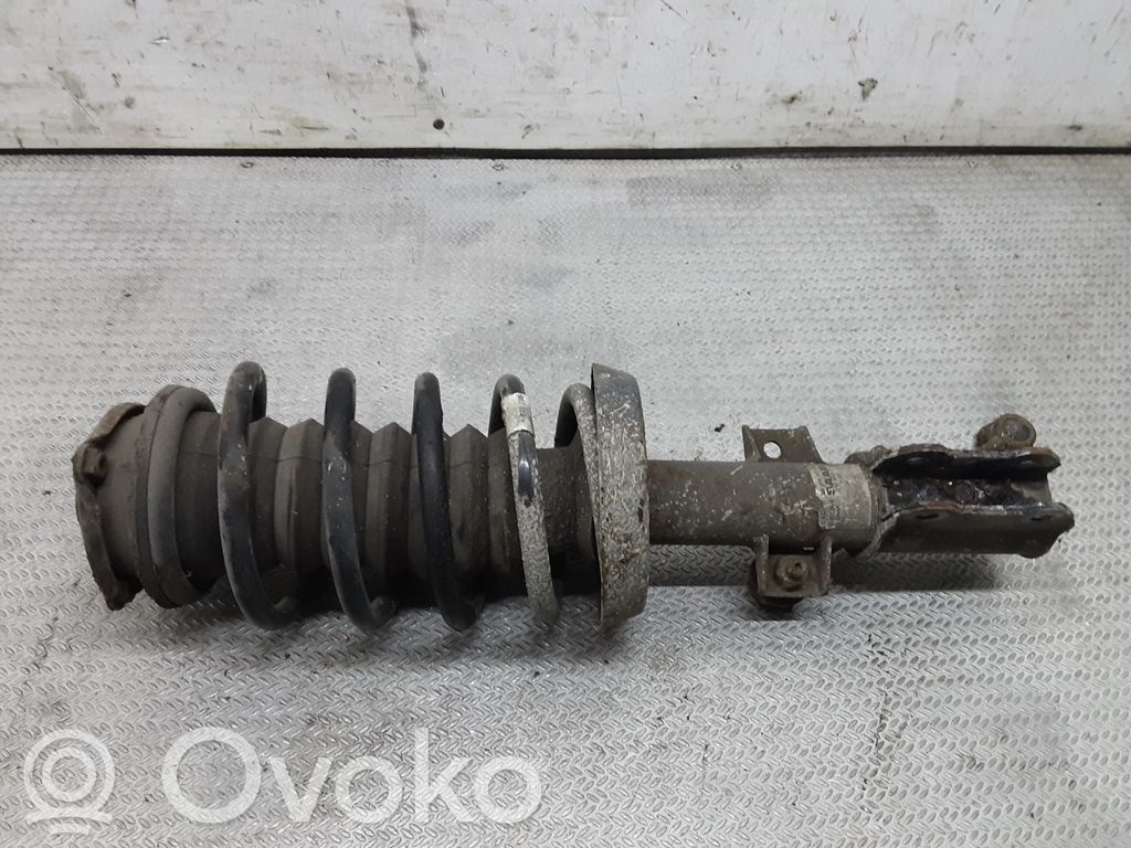 Saab 9-5 Amortyzator osi przedniej ze sprężyną 