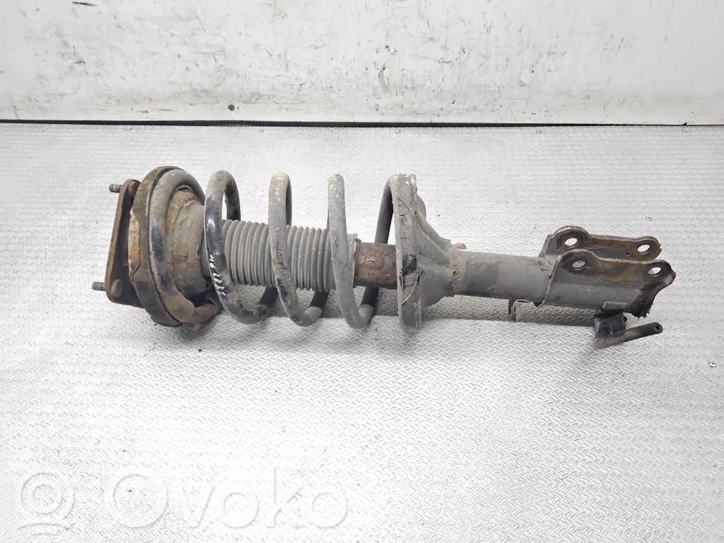 Front shock absorber with coil spring