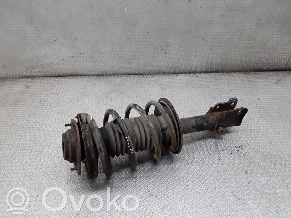 Front shock absorber with coil spring