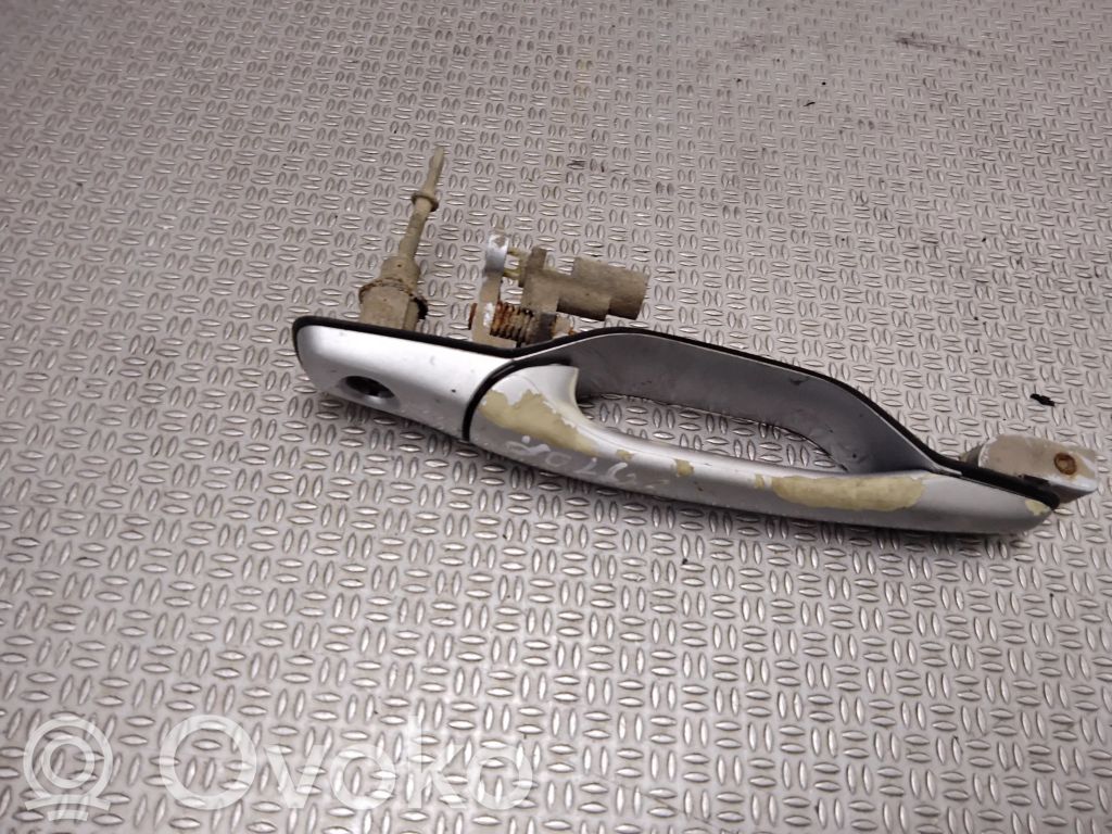 Mitsubishi Grandis Manecilla externa puerta delantera 