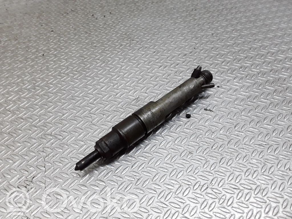 Inyector de combustible   038130202A