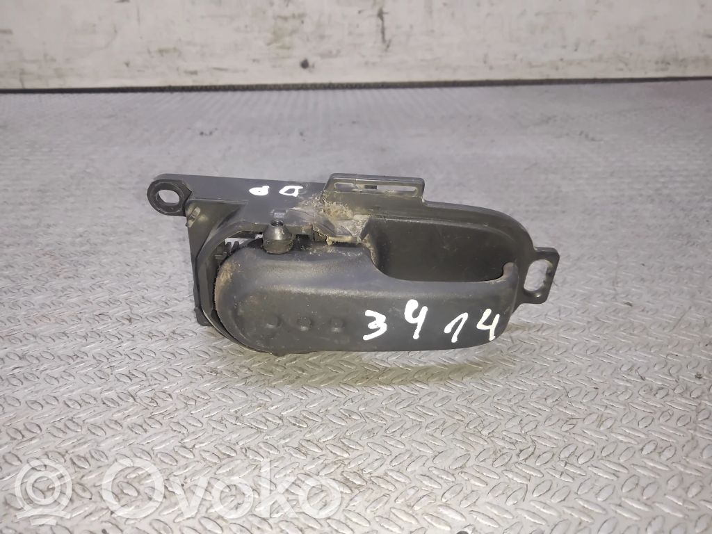 Nissan Note (E11) Front door interior handle 