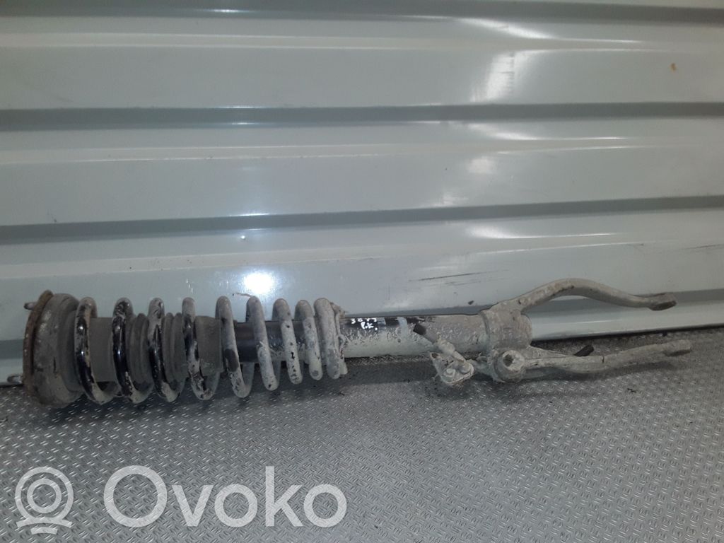 Front shock absorber with coil spring