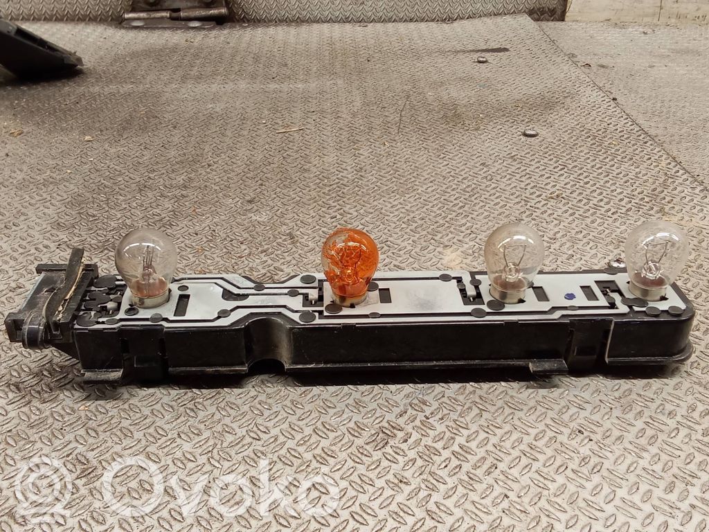 Tail light bulb cover holder   6C1113N004A