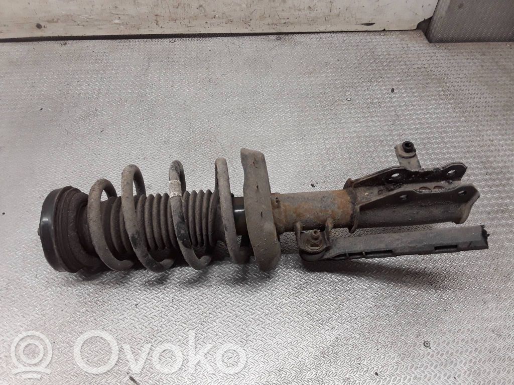 Front shock absorber with coil spring