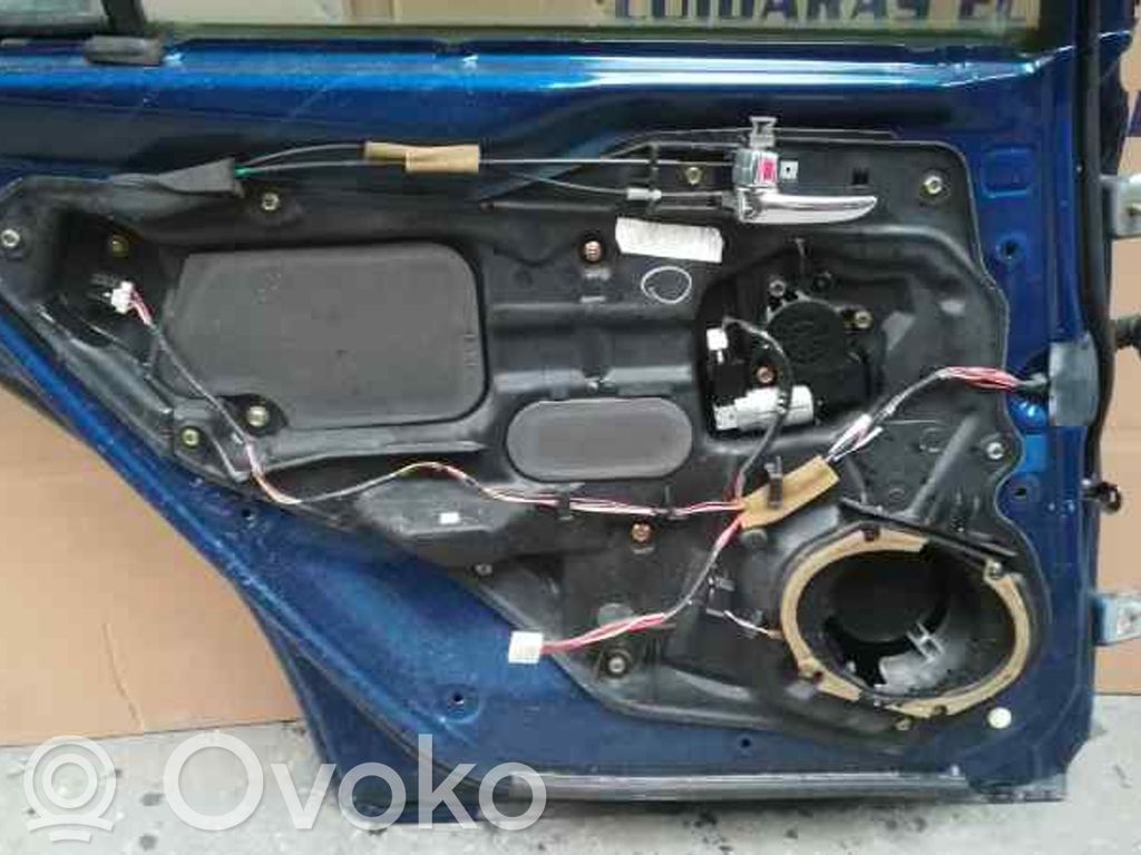 Regulador de puerta trasera con motor