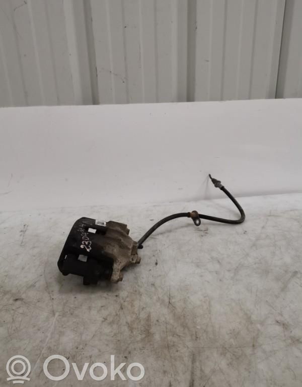 Toyota Yaris Zacisk hamulcowy przedni 