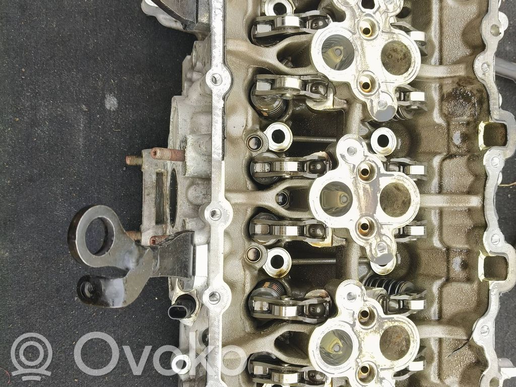 Engine head   06M103403AG