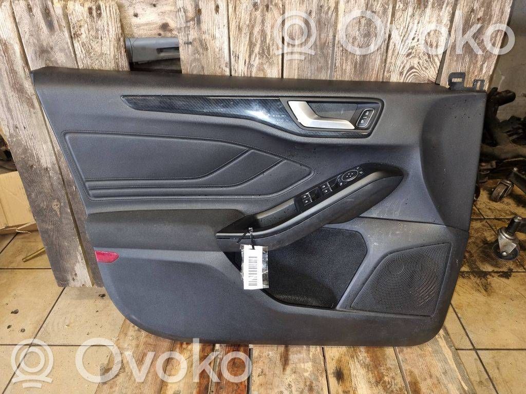 Ford Focus Обшивка передней двери 