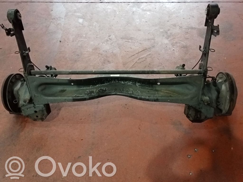 Rear axle beam with reductor