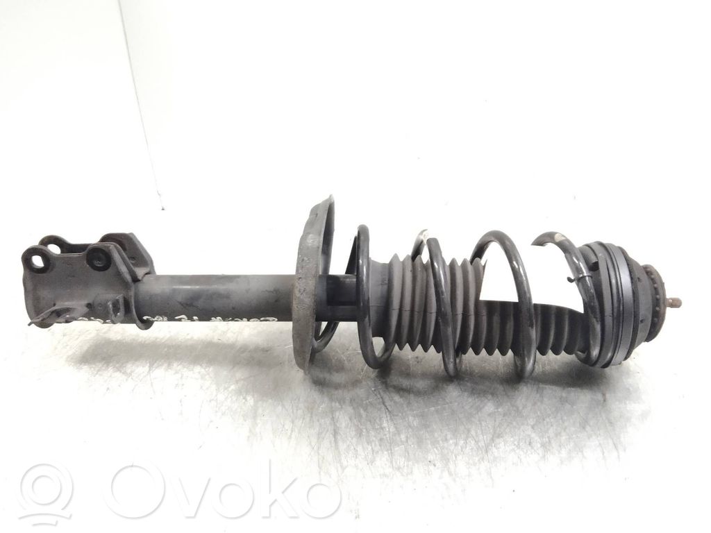 Opel Corsa D Front shock absorber with coil spring 