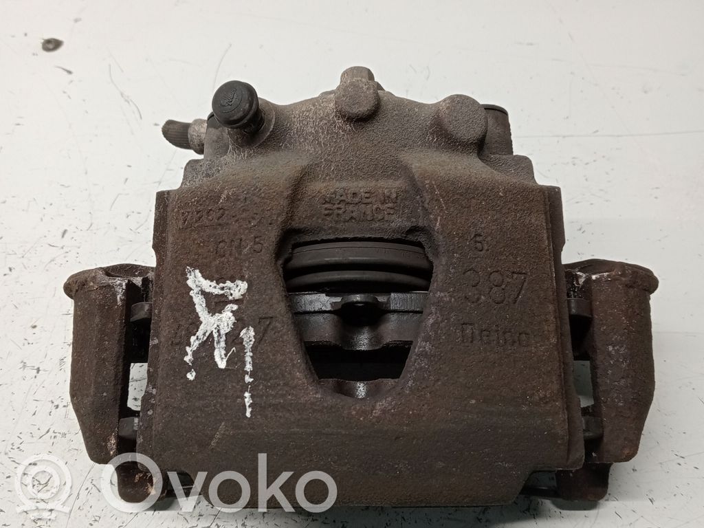 Opel Corsa B Front brake caliper 