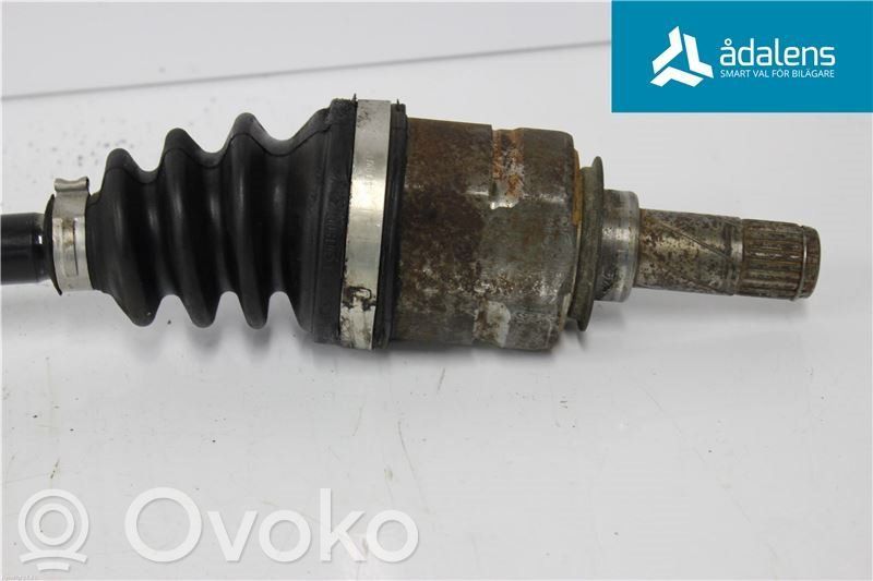 Opel Corsa D Eje de transmisión delantero 