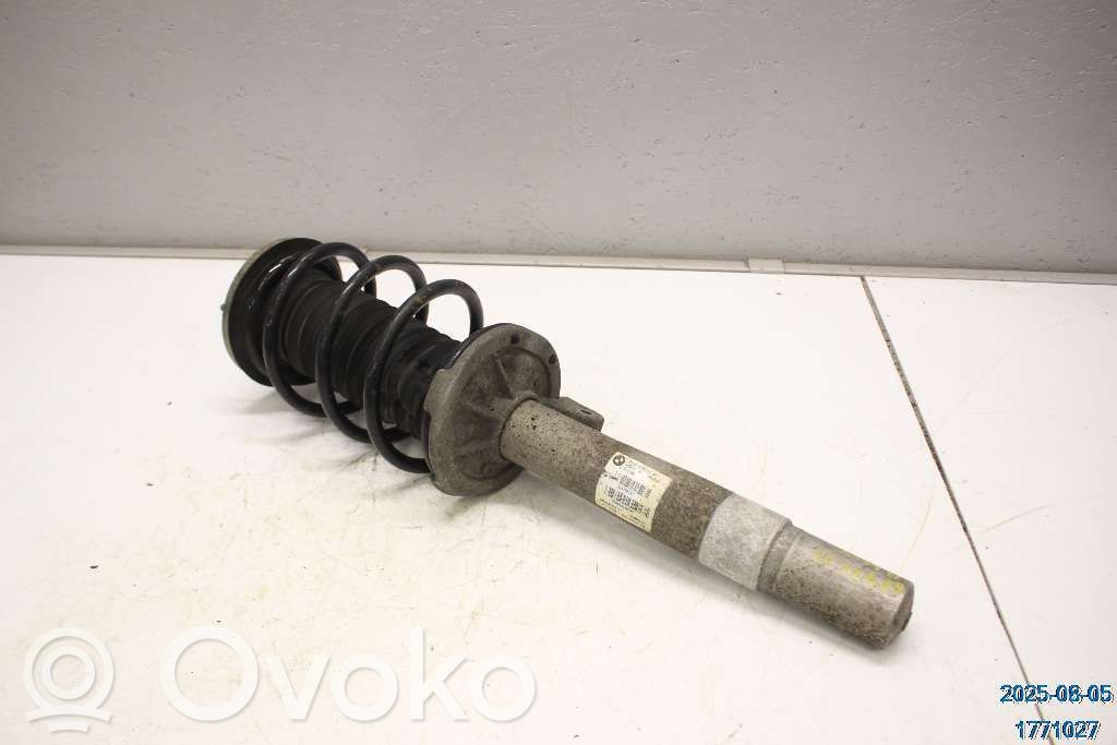 Front shock absorber with coil spring   31316786539