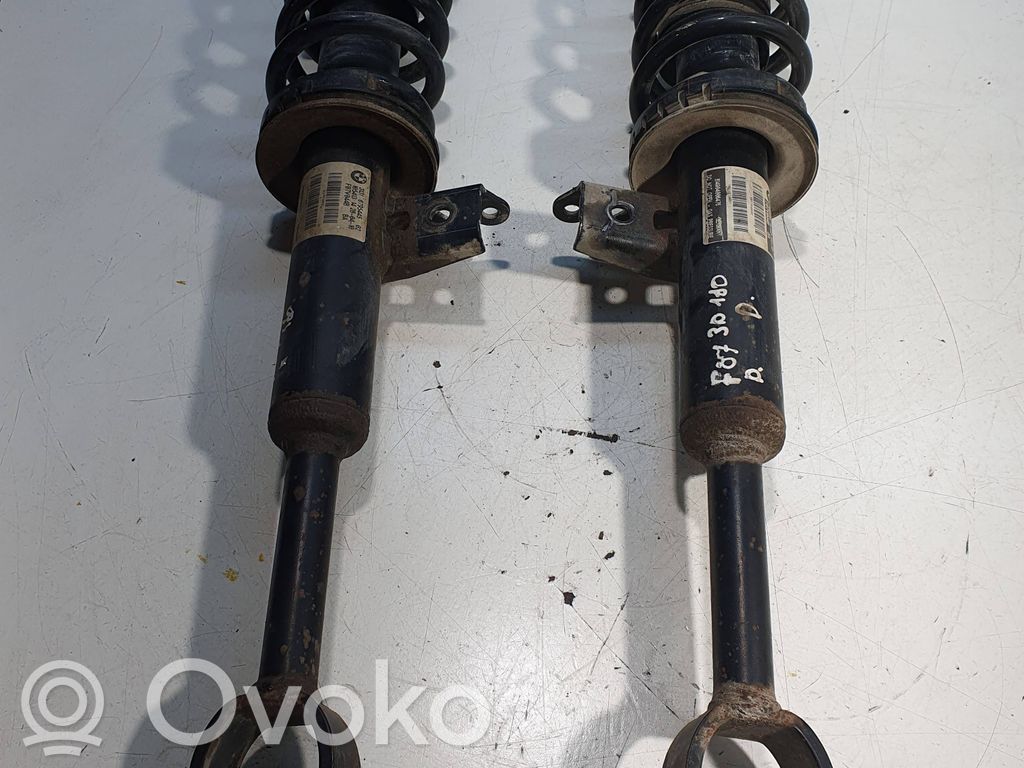 Amortyzator osi przedniej ze sprężyną   6795446,1054131428,F07V044B