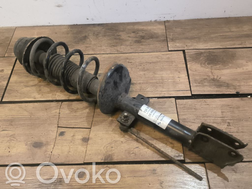 Dacia Duster Amortyzator osi tylnej ze sprężyną 