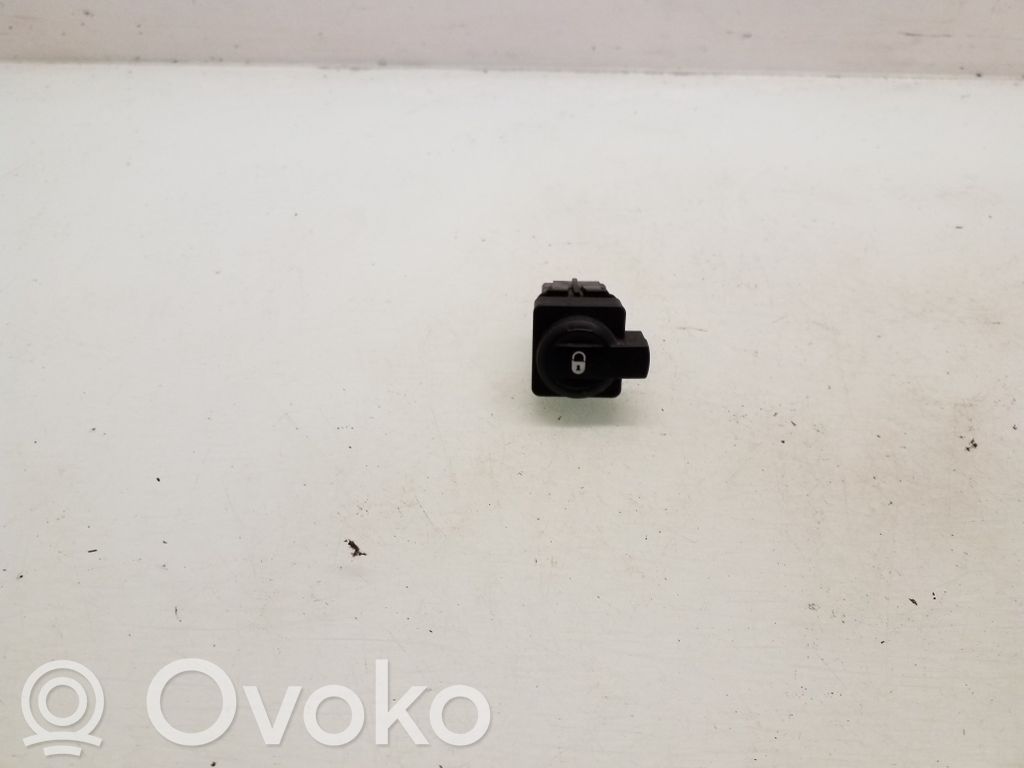 Botón interruptor de bloqueo de puertas