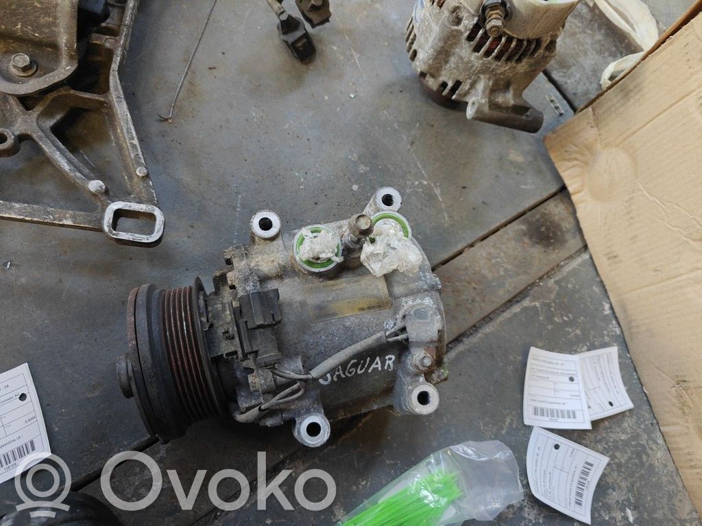 Air conditioning (A/C) compressor (pump)   YR8H19D629AA