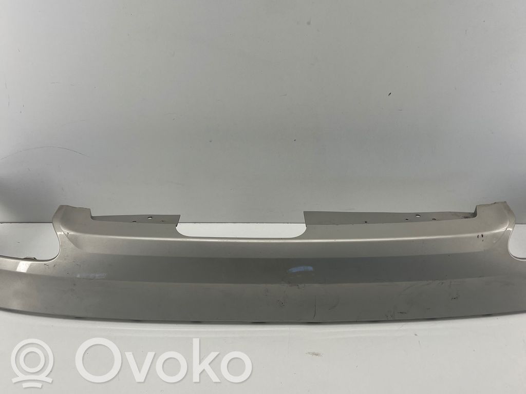Volvo XC60 Moldura inferior del parachoques trasero 