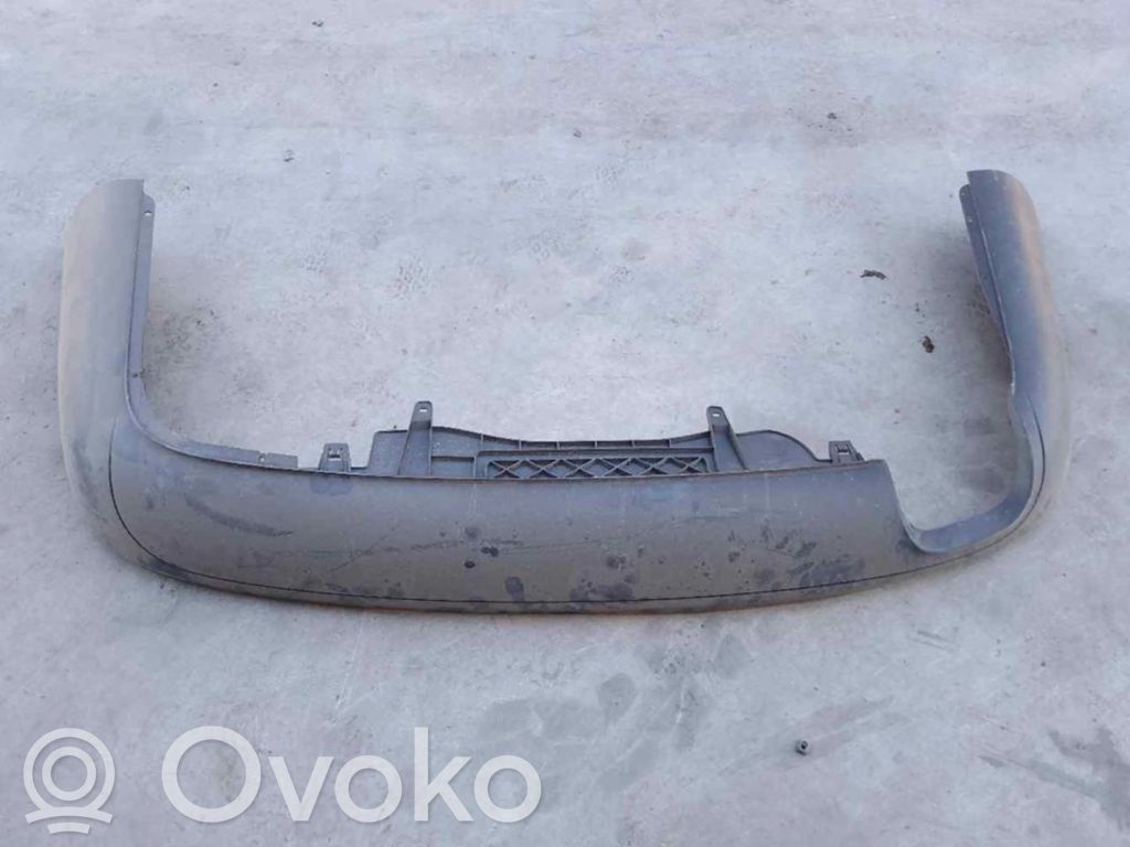 Volkswagen PASSAT Protector/cubierta de la carrocería inferior del parachoques trasero 