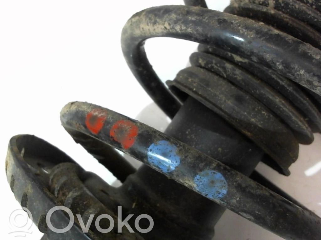 Volkswagen Polo Amortyzator osi przedniej ze sprężyną 