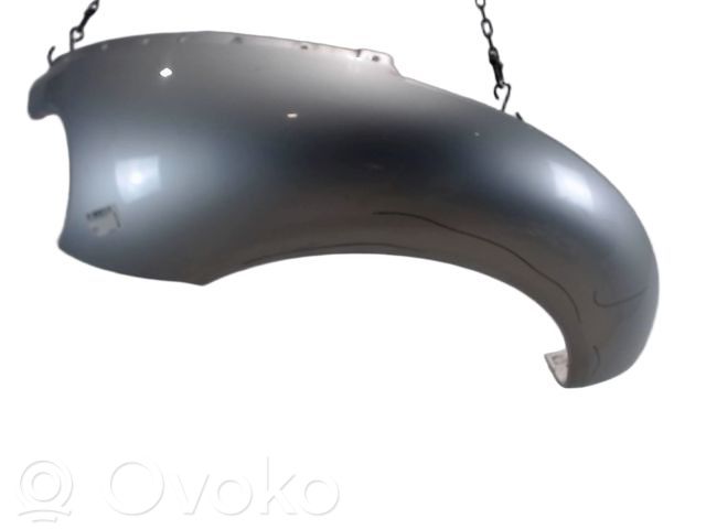 Volkswagen New Beetle Błotnik przedni 
