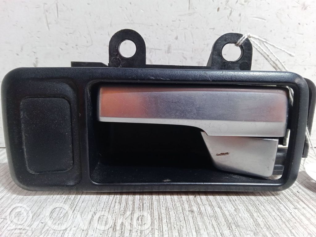 Manecilla interna puerta delantera