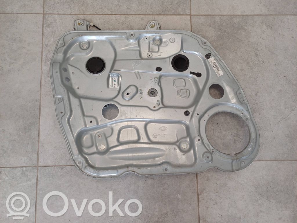 KIA Carens I Elektryczny podnośnik szyby drzwi przednich 