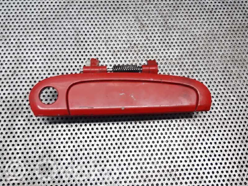 Manecilla externa puerta delantera