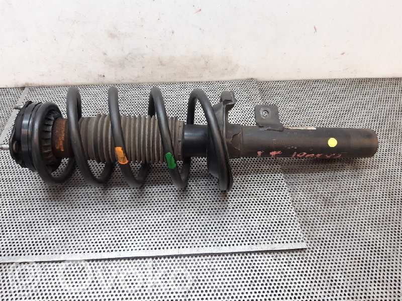 Front shock absorber with coil spring
