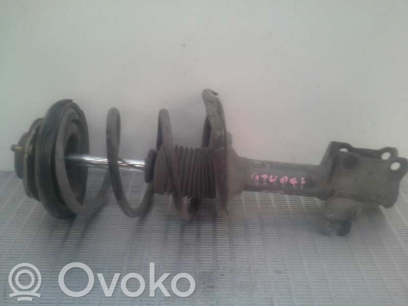 Nissan Almera N16 Front shock absorber with coil spring 