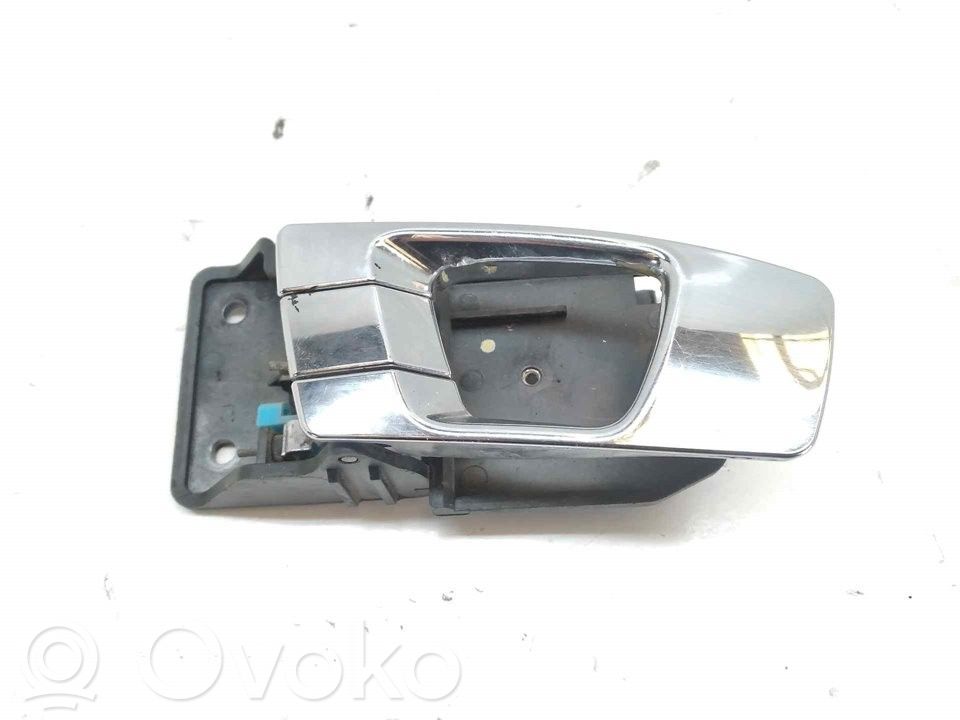 KIA Carens I Manecilla interna puerta delantera 