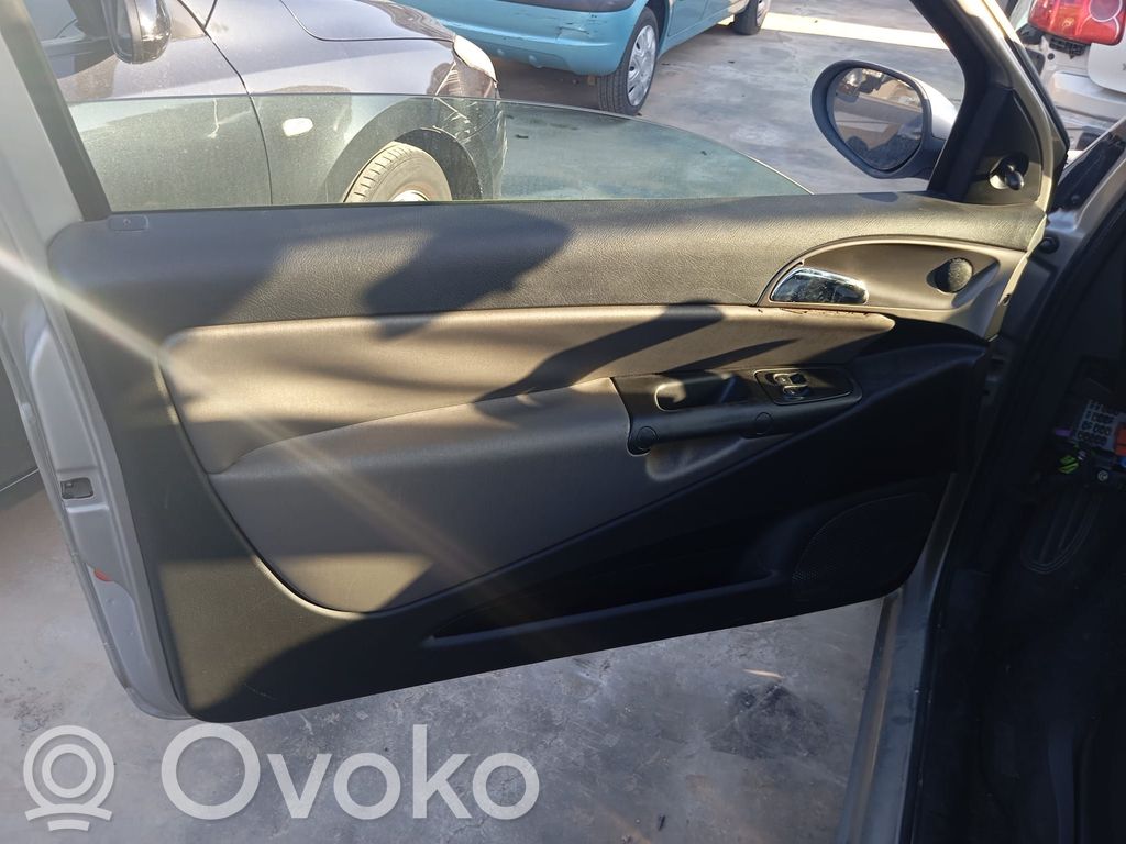 Regulador de puerta delantera con motor