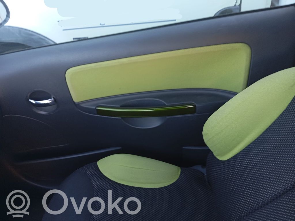 Regulador de puerta delantera con motor