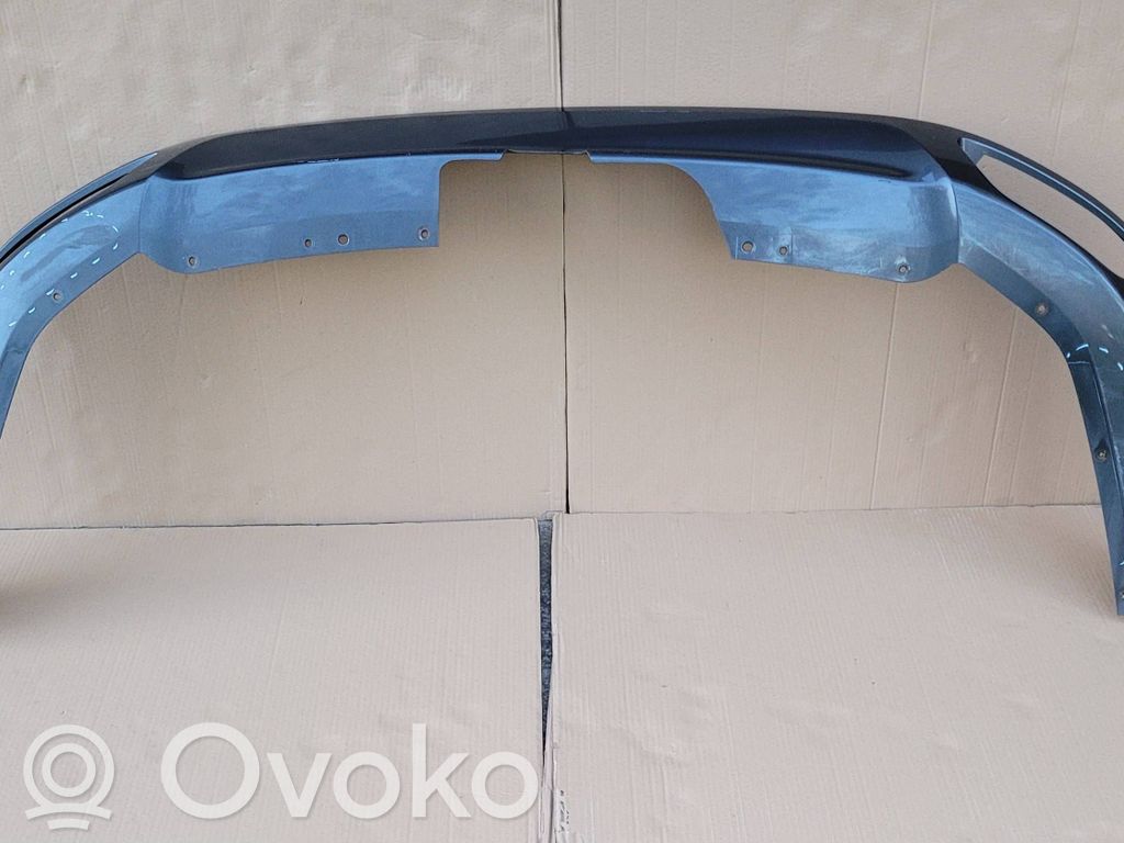 Ford Mondeo MK V Moldura inferior del parachoques trasero 