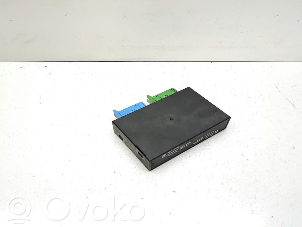 BMW 5 E34 Komforto modulis 