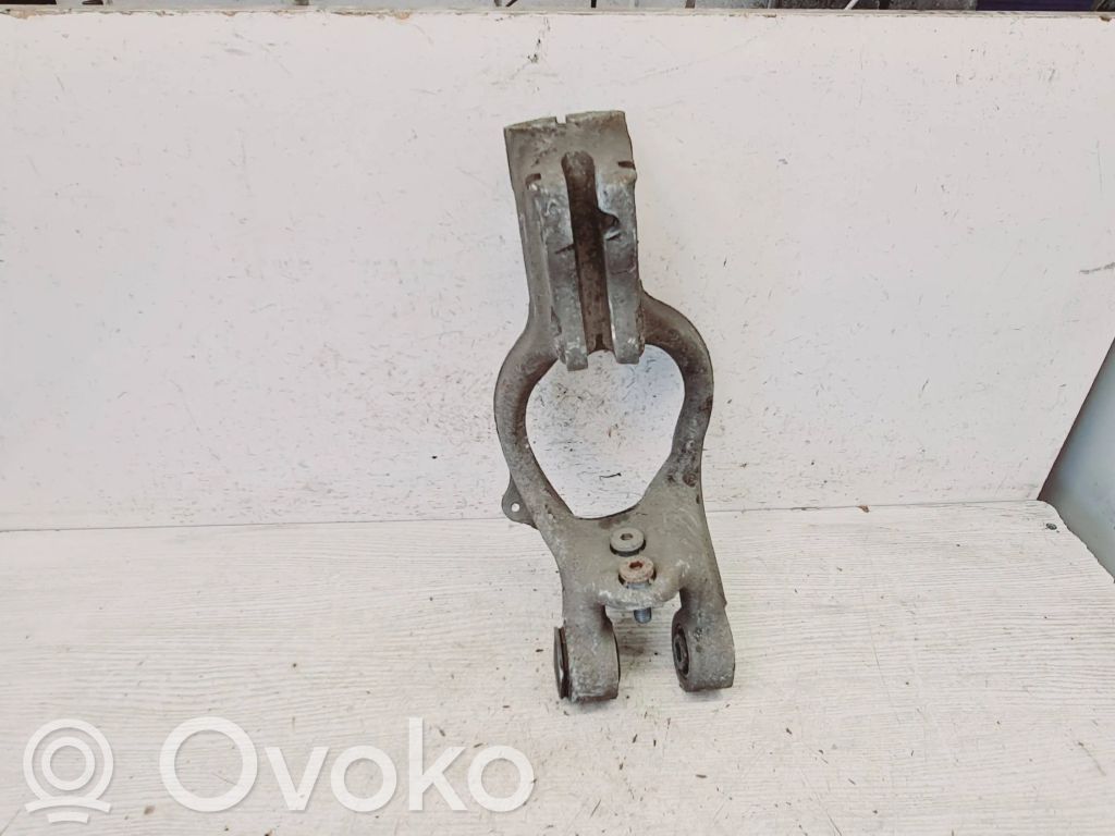 Mocowanie / Wspornik dolny amortyzatora osi przedniej   13248556,124BF283