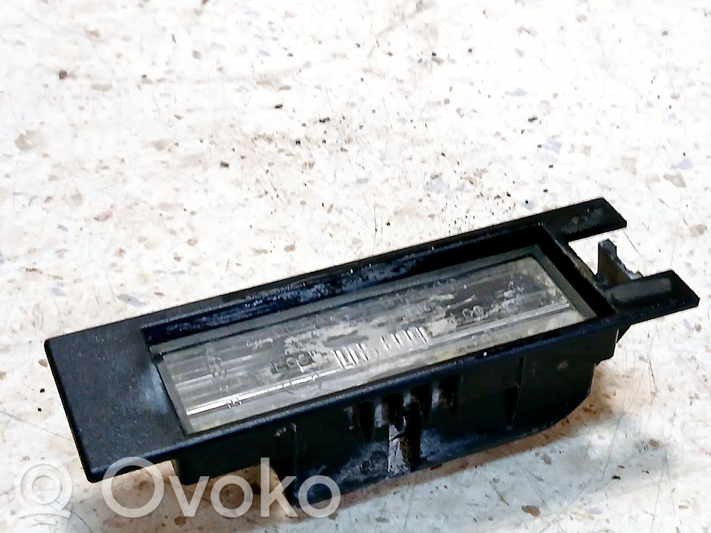 Opel Astra H Éclairage de plaque d'immatriculation 
