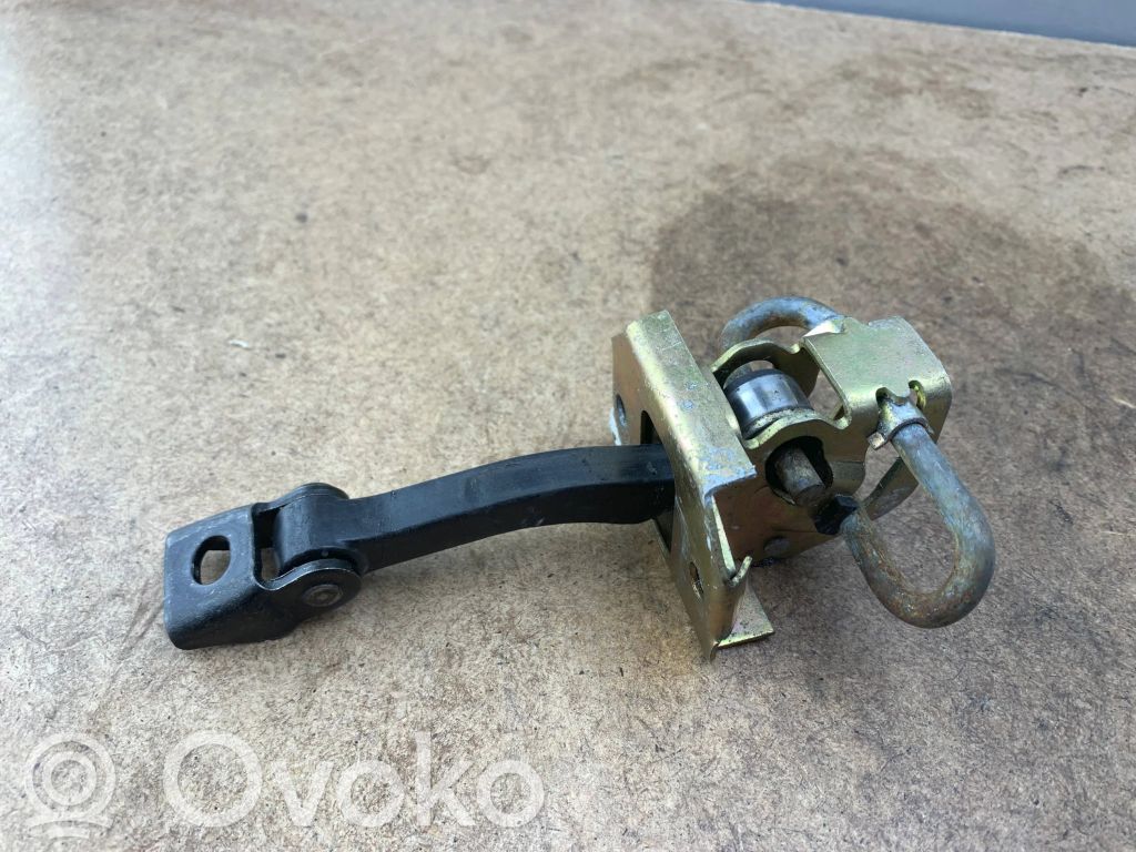 Front door check strap stopper   8160959,51218160959