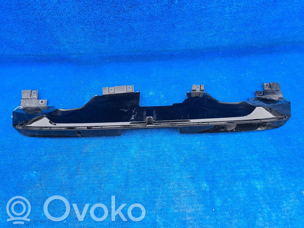 Opel Astra L Moldura inferior del parachoques trasero 