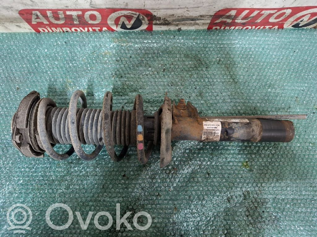 Volkswagen Golf VI Amortyzator osi przedniej ze sprężyną 