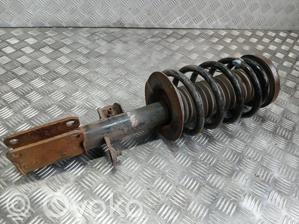 Front shock absorber with coil spring