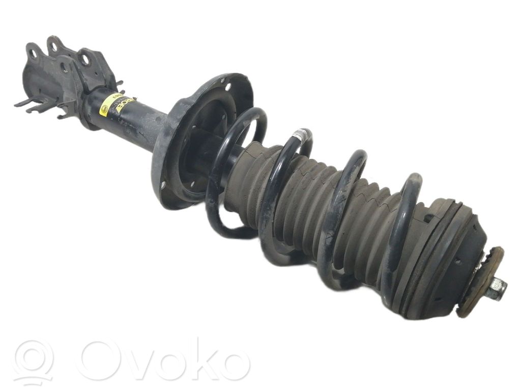 Opel Corsa D Amortiguador delantero con muelle espiral 