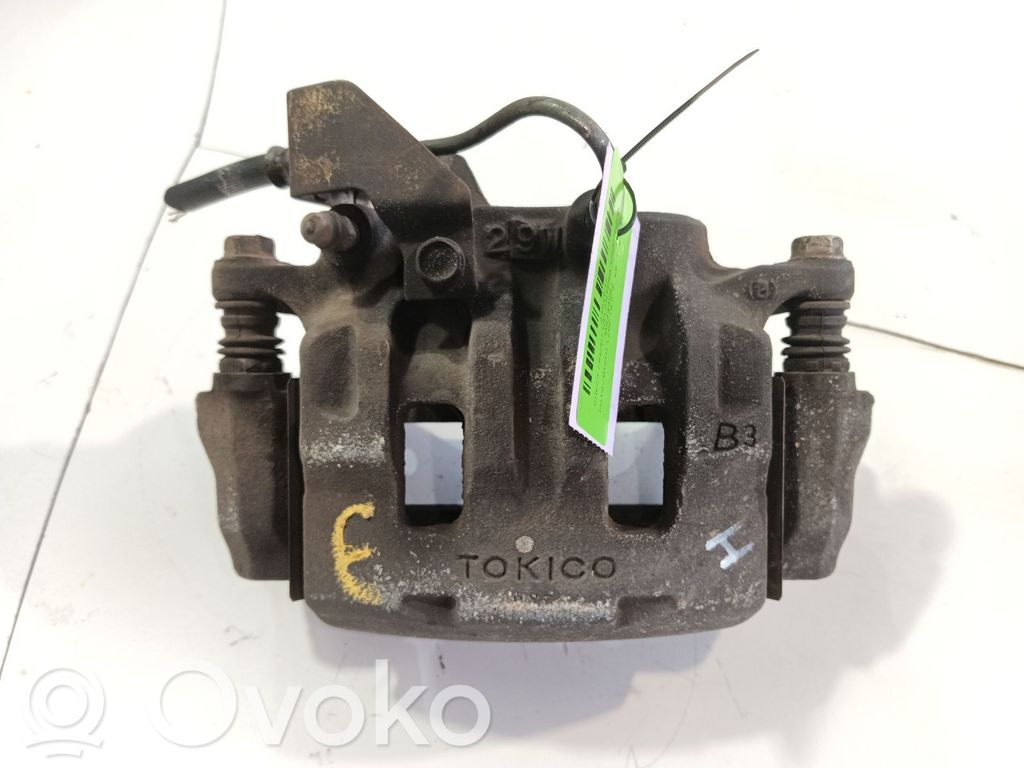 Mitsubishi L200 Zacisk hamulcowy przedni 