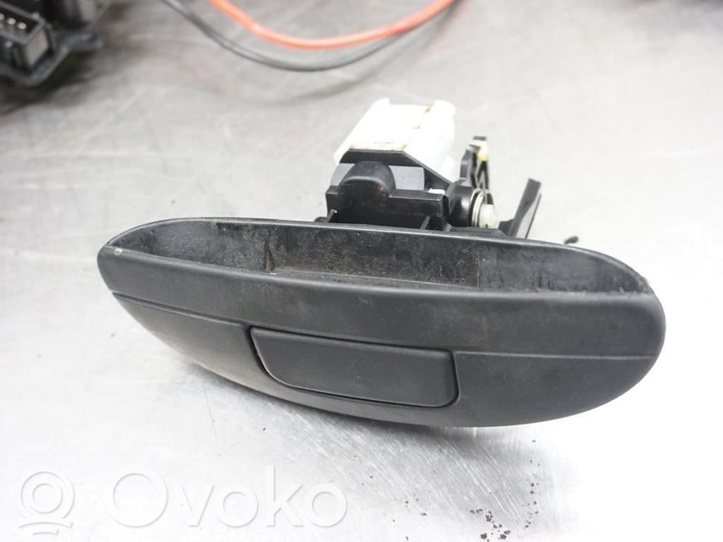 Renault Scenic I Front door lock (next to the handle) 