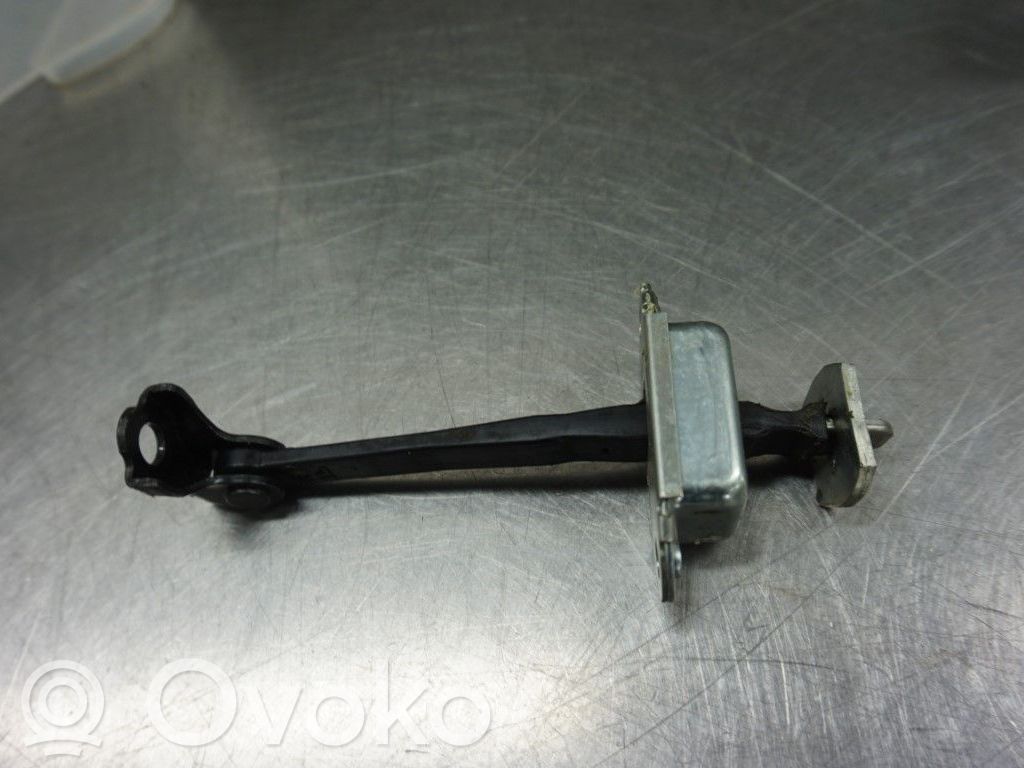 Nissan Note (E11) Etuoven pidätin 