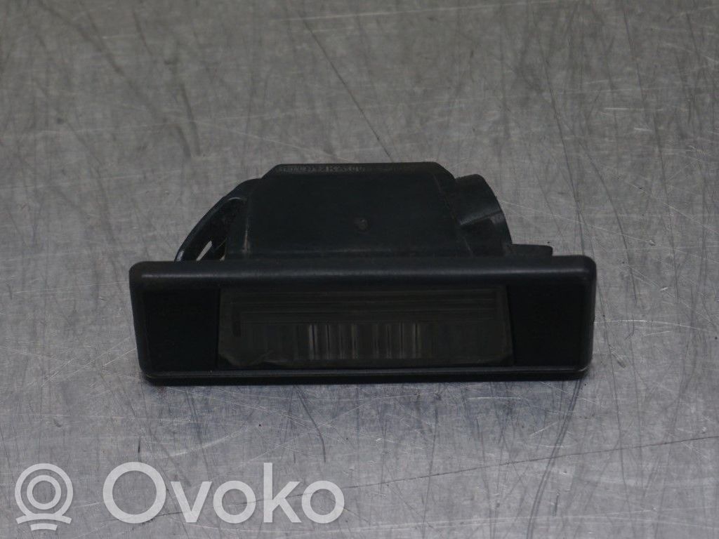 Nissan Qashqai+2 Lampa oświetlenia tylnej tablicy rejestracyjnej 