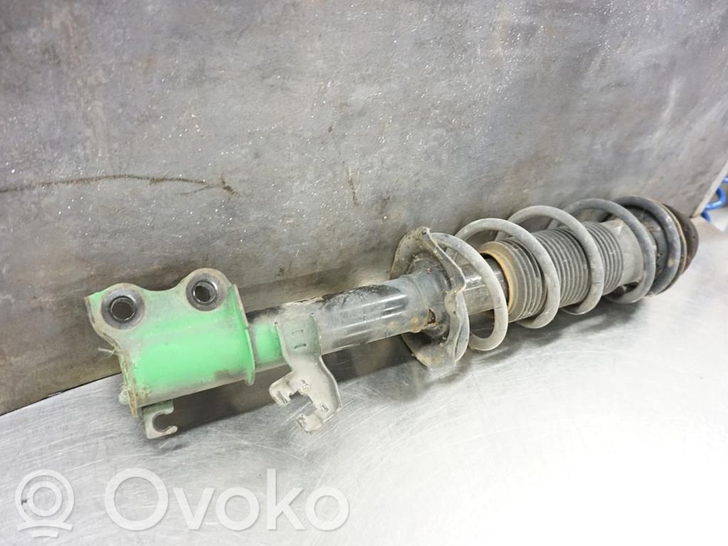 Nissan Note (E12) Front shock absorber with coil spring 