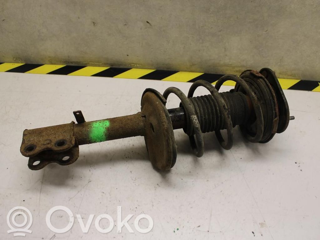 Toyota Corolla E110 Priekšpusē amortizators ar atsperi 